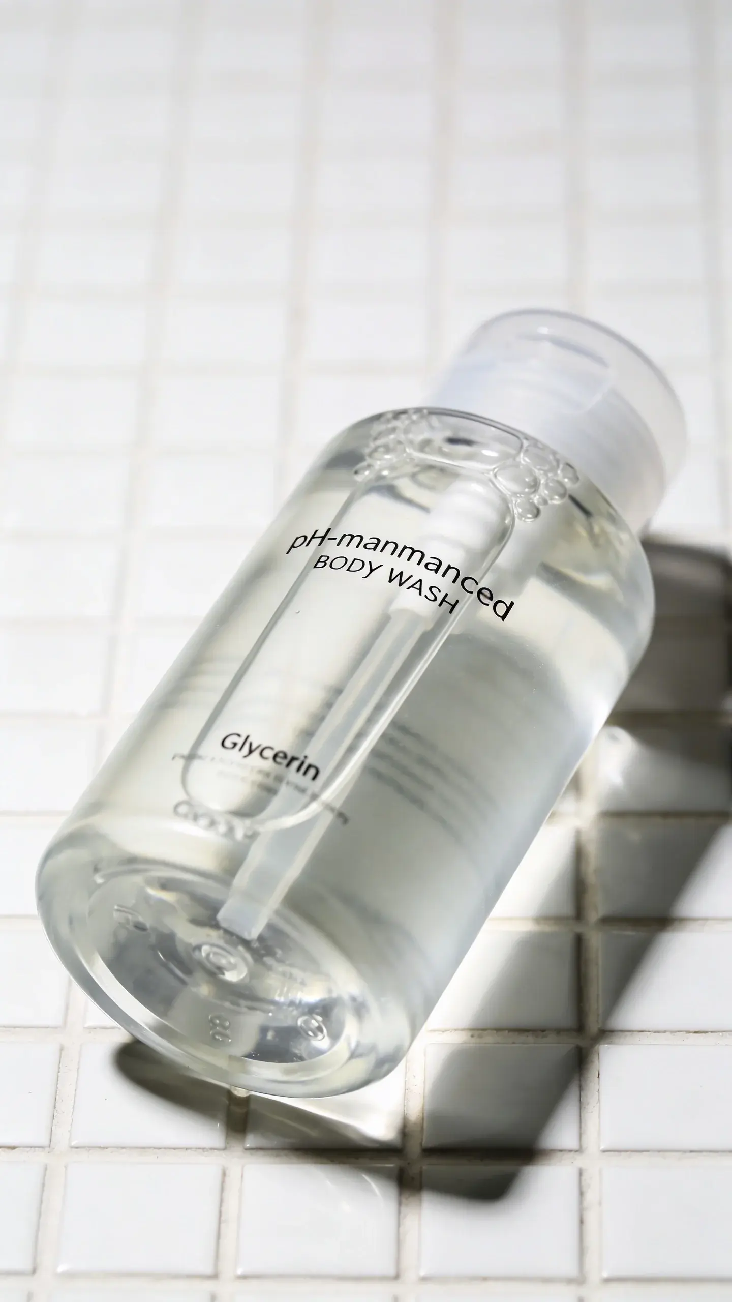 pH-balanced body wash with glycerin on white tile