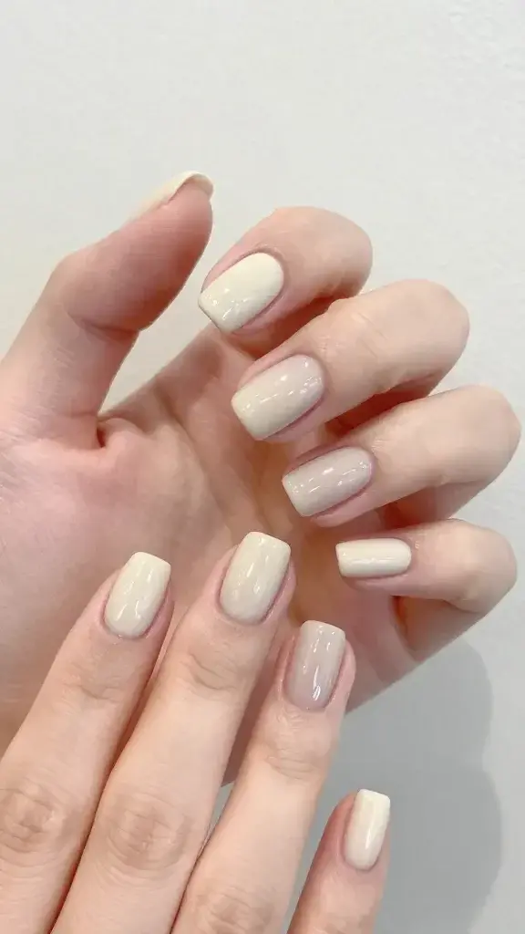 short nude nails, creamy beige, glossy top coat
