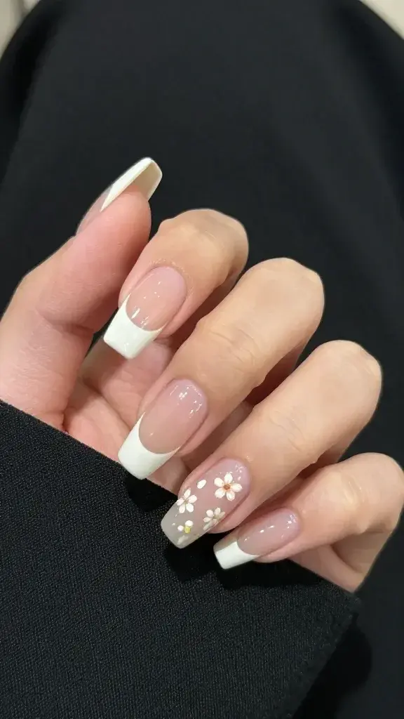soft French almond nails, scattered micro florals